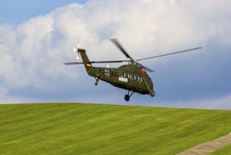 A Sikorsky S-58C transport helicopter in the colours of the German Army with the registration