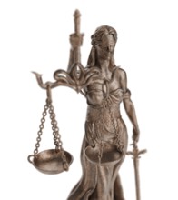 Bronze lady of justice statue isolated on a white background