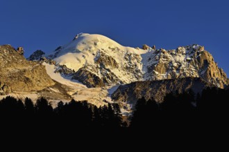 Aiguille des Grands Montets and snow-covered Aiguille Verte, Chamonix-Mont-Blanc, Haute-Savoie,
