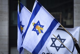 Numerous people gather for a vigil at the Hauptwache in Frankfurt am Main on the second anniversary