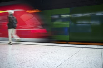 Underground arriving S-Bahn, train, class 420 in traffic red, platform, stop, Stadtmitte station,