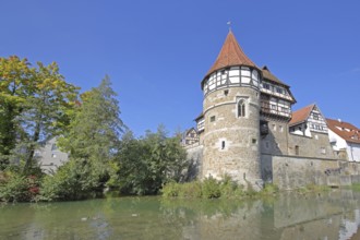 Zollern Castle built around 1255 with water tower on the Eybach stream, half-timbered house,