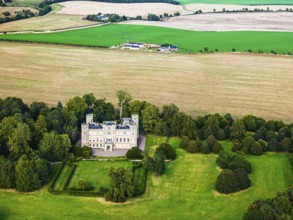 Wedderburn Castle and Barns over fields from a drone, Duns, Berwickshire, Scotland, UK