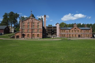 Brick building, former paper factory and mill for the production of groundwood pulp board, UNESCO