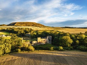Ruins of Hailes Castle over River Tyne from a drone, East Linton, East Lothian, Scotland, UK