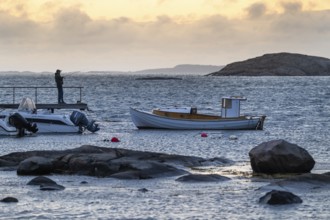 Small bay, archipelago, jetty with angler, Resö Island, Bohuslän, Skagerrak, Sotenäs, Västra