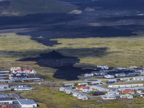 Lava, lava field, village, houses, summer, cloudy, sunny, aerial view, volcanic eruption, July