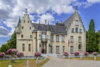 Kasteel Cortewalle, 15th century moated castle in Flemish Renaissance style at Beveren in summer,