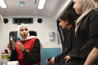 Syrian Arab Red Crescent volunteers conduct first aid training for children during the Damascus