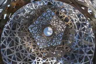 Steel sphere, Sphere, a work of art by Ólafur Eliasson, Fünf Höfe shopping arcade, Munich, Bavaria,