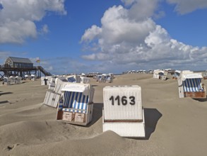 Sand drifts on the North Sea beach, blue sky, white clouds, summer, sun, sand, pile dwelling,