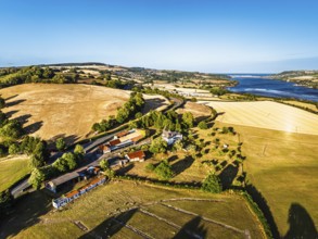 Farms and Fields over River Teign and Teignmouth Road from drone, Newton Abbot, Devon, England,