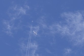 Two airliners Airbus A380 jet passenger aircraft of Emirates airlines and a Boeing 737 of Norweign
