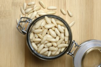 Pine nuts in glass containers, Pinus pinea