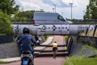 Rijnwaalpad long-distance cycle path, near the village of Elst, subway of the A15 motorway, wide