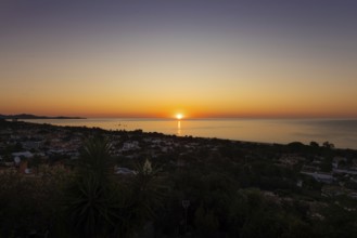 The sun rises on the Costa Rei, a stretch of coastline on the Italian Mediterranean island of