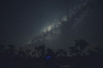 Milky Way in the Australian outback. Camping in a Landrover rooftop tent, Australia