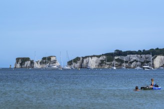 Boats on sea over Knoll Beach Studland, Poole, Dorset, England, United Kingdom