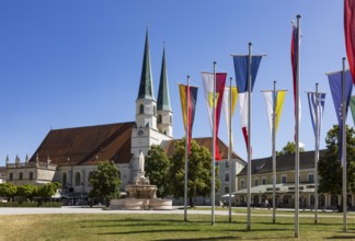 National flags at Kapellplatz with the collegiate parish church of St Philip and St James, place of