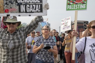 Detroit, Michigan USA - 26 July 2025 - Protesters rally at Eastern Market, banging empty pots to