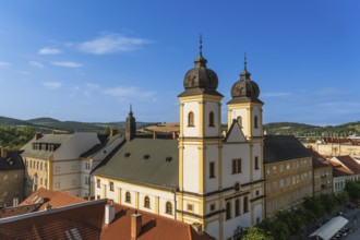 View from the city tower of the Piarist Church of St Francis Xavier and the old town in the evening