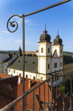 View from the city tower of the Piarist Church of St Francis Xavier and the old town in the evening