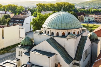 View through a window of the city tower to the Neologue Synagogue by Berlin architect Richard