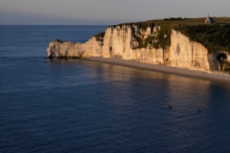 Rock arch Falaise or Porte d'Amont, beach, church Chapelle Notre Dame de la Garde, Étretat, sea,