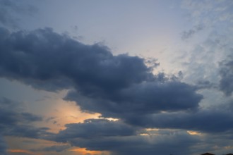 Rain clouds (Nimbostratus) in the evening sky, Bavaria, Germany