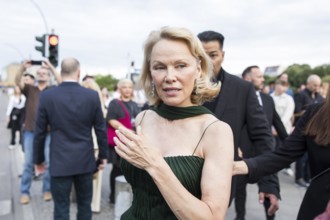 Pamela Anderson attends the film premiere of The Naked Gun at the UCI Luxe East Side Gallery,