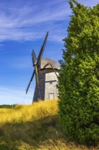 Historic windmill in an epic summer landscape near the burial ground of Stenhusbacken and the