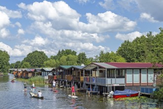 Canoeing, stand-up paddling, boathouses, holiday homes on the canal between Mirower See and