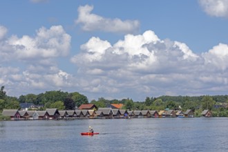 Boathouses, holiday homes on Lake Mirow, canoe, Mirow, Mecklenburg Lake District,
