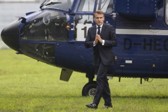 Emmanuel Macron (President of the French Republic) leaves a federal police helicopter in front of a