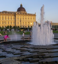 The Lustgarten with fountain and the Humboldt Forum, Berlin, Germany