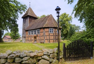 The village church of Karrenzin is a half-timbered church dating from 1721. The boarded tower on