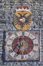 Colourful tower clock with coat of arms, Zwölferturm, historic old town, Sterzing, South Tyrol,