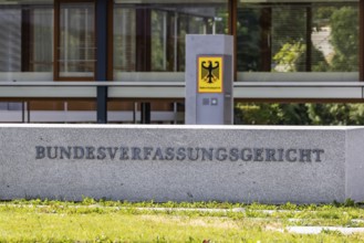 Federal Constitutional Court (BVerfG) . Exterior view with official sign and federal eagle.