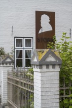 Sign and fence at the Theodro Storm House, Theodor Storm Centre, Museum, Old Town, Husum, North