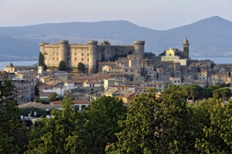 Castello Odescalchi fortress, Duomo Santo Stefano cathedral, behind Lake Bracciano, Lago di