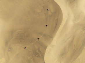 Quad bikes in the dunes of the Namib Desert in the vicinity of the coastal town of Swakopmund.