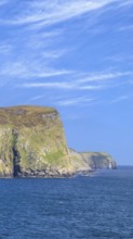 Scotland Shetland scenery in England with cliffs, ocean views and green pastures