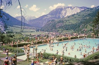 Crowded swimming pool on sunny summer day Oetz, Imst district, Tyrol, Austria, Europe, 1970