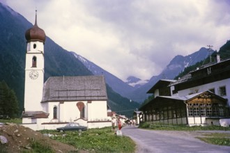 Historic village buildings and church of Maria Hilf, Gries im Sulztal, Ötztal Alps, Tyrol, Austria,