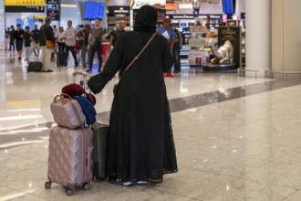 Arab woman with traditional garment and headdress