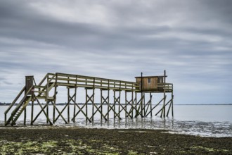 Fishing huts over Randonnee entre Histoire et Nature from a drone, Fouras, Fouras-les-Bains,