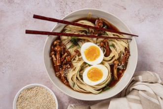 Buckwheat noodles soba with shimeji mushrooms, with boiled egg, green onion, sesame seeds,