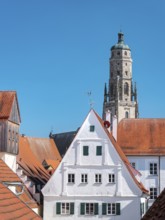 View from the medieval town wall over the houses of the historic old town to the tower of St