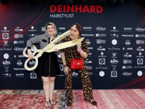 Janine Becker and Julian F. M. Stöckel at the VIP opening of the new Deinhard Salon Am Mühlanger 3,