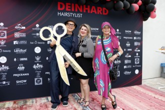 Rolf Scheider, Janine Becker and Barbara Engel at the VIP opening of the new Deinhard Salon Am